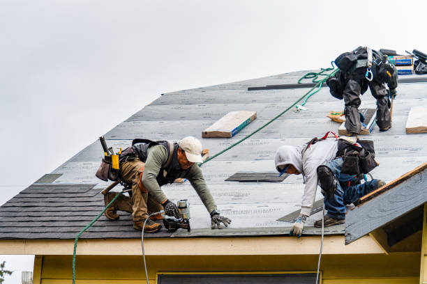 Professional Roofing technician working in Sunset Beach, CA